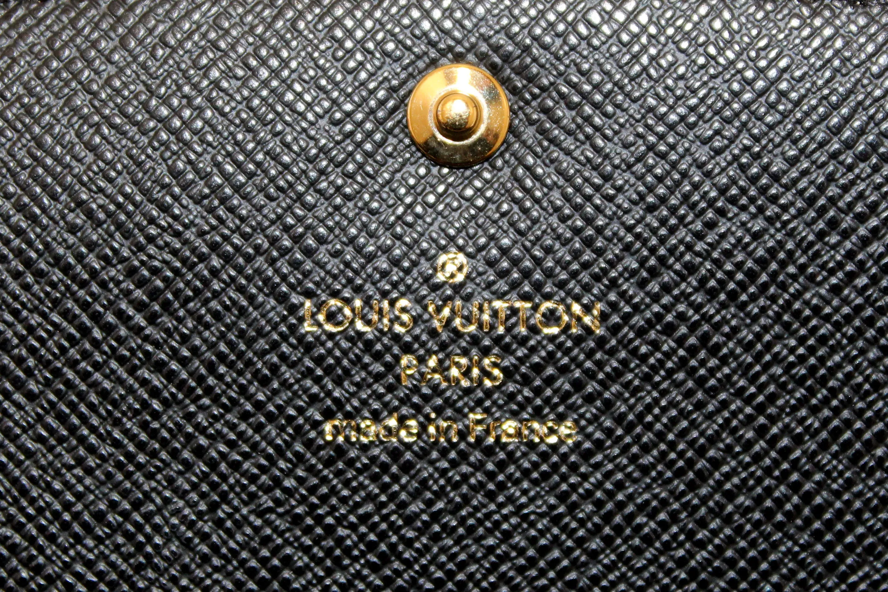 Authentic Louis Vuitton Classic Monogram and Monogram Reverse Canvas Emilie Wallet